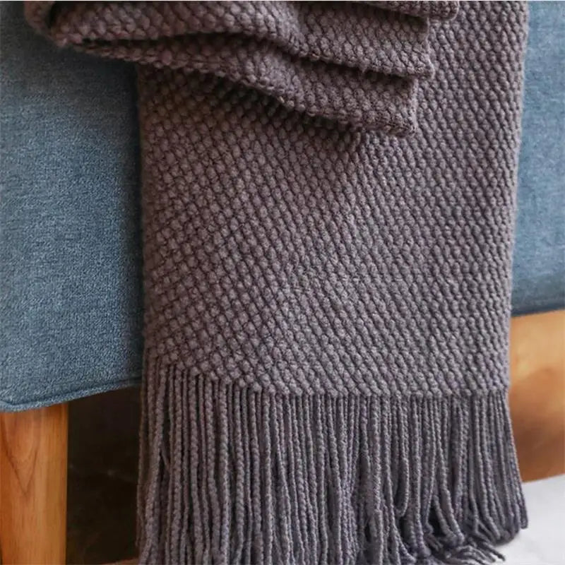 Plaid tricoté doux à franges