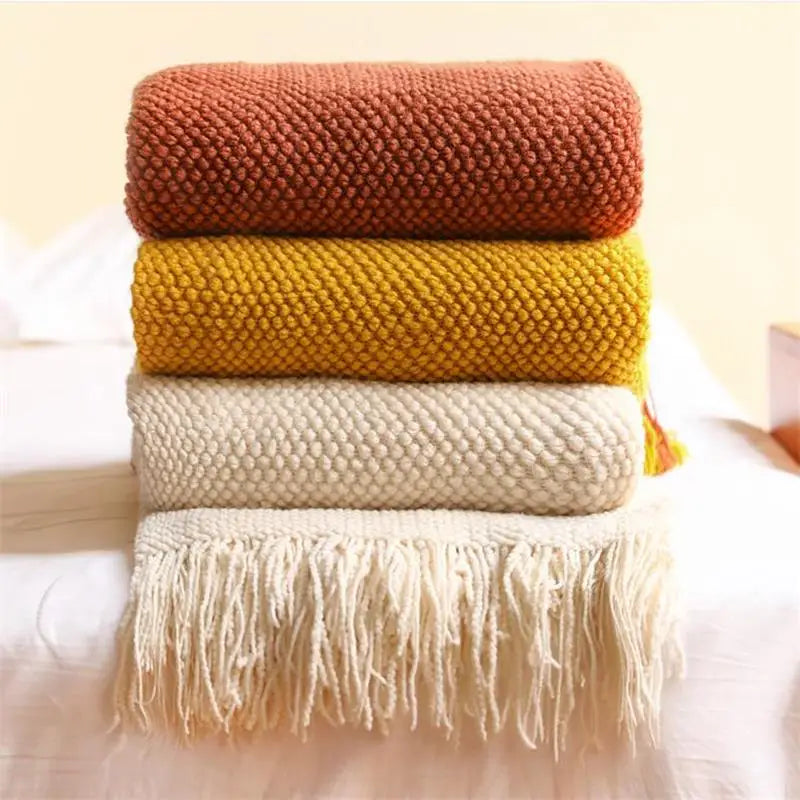Plaid tricoté doux à franges